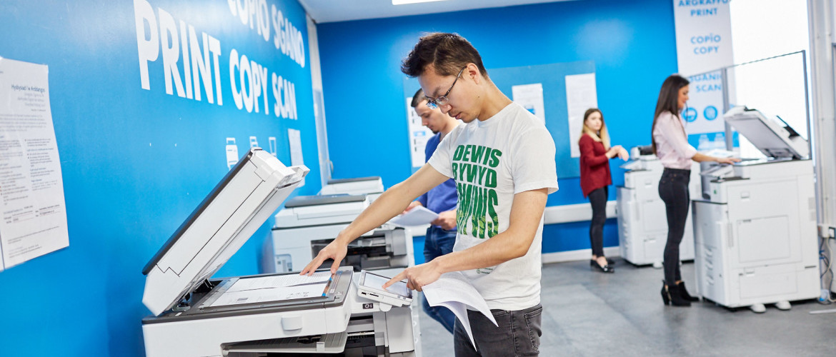 Man at photocopier